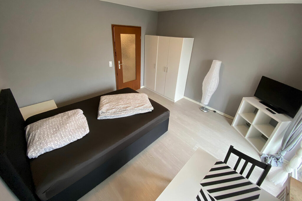 Blick in das Schlafzimmer im City Apartment in Mannheim